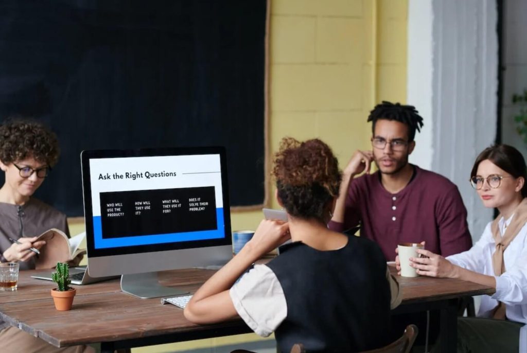 four people on a meeting pre seed startup funding