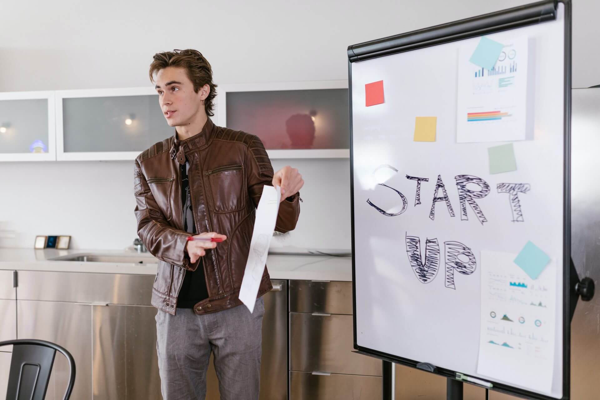 man discussing about start up entrepreneur incubator program 1