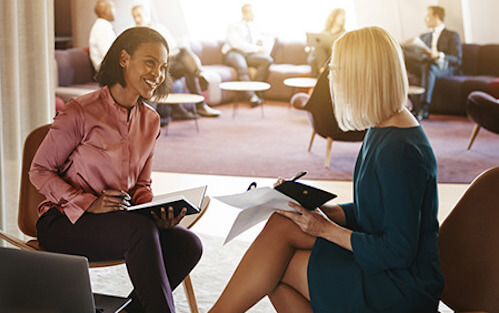 professional doing interview to a woman pre seed funding investors